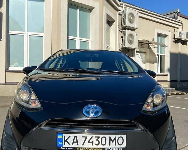 Черный Тойота Aqua, объемом двигателя 1.5 л и пробегом 117 тыс. км за 12700 $, фото 1 на Automoto.ua