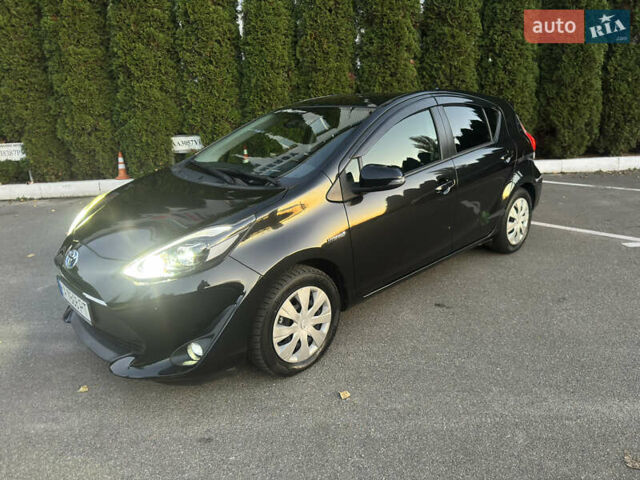 Черный Тойота Aqua, объемом двигателя 1.5 л и пробегом 135 тыс. км за 12800 $, фото 1 на Automoto.ua