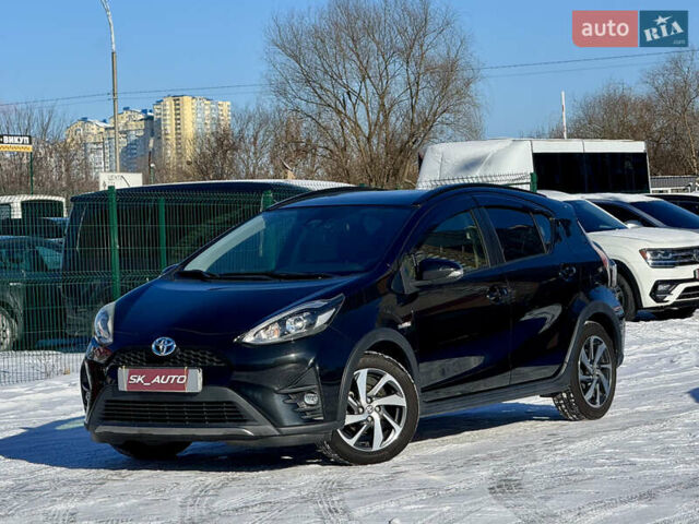 Чорний Тойота Aqua, об'ємом двигуна 1.5 л та пробігом 124 тис. км за 13900 $, фото 1 на Automoto.ua
