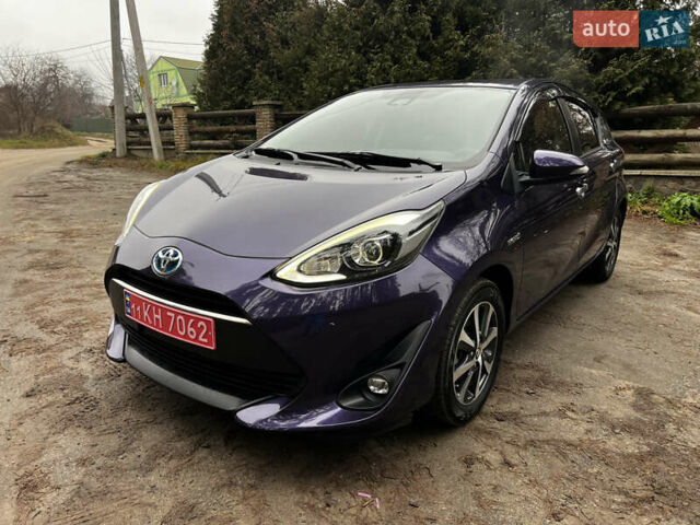 Фіолетовий Тойота Aqua, об'ємом двигуна 1.5 л та пробігом 57 тис. км за 13200 $, фото 1 на Automoto.ua