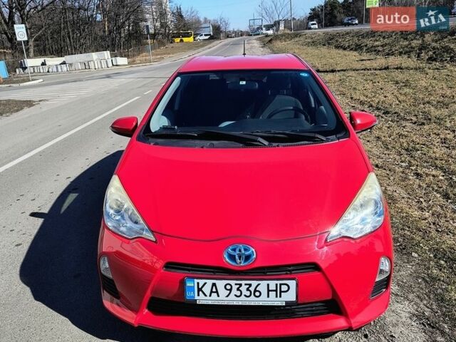 Красный Тойота Aqua, объемом двигателя 1.5 л и пробегом 125 тыс. км за 9999 $, фото 1 на Automoto.ua