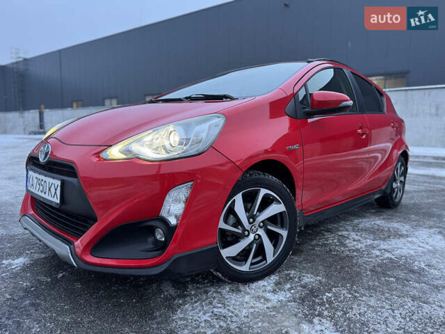 Красный Тойота Aqua, объемом двигателя 1.5 л и пробегом 76 тыс. км за 11750 $, фото 1 на Automoto.ua