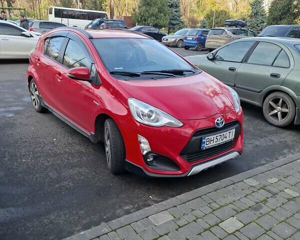 Червоний Тойота Aqua, об'ємом двигуна 1.5 л та пробігом 82 тис. км за 11500 $, фото 1 на Automoto.ua