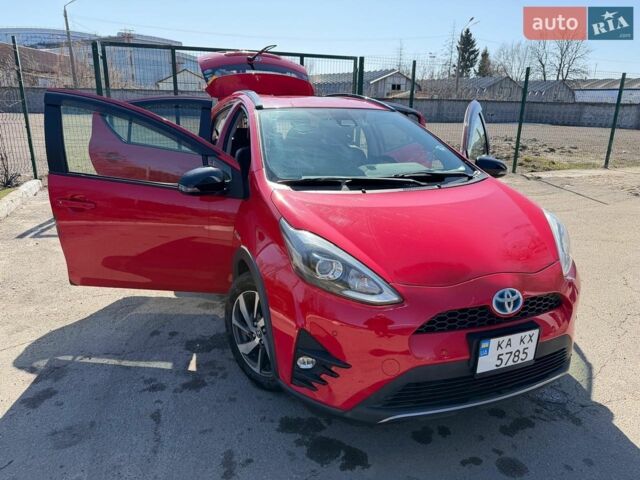Красный Тойота Aqua, объемом двигателя 1.5 л и пробегом 32 тыс. км за 14999 $, фото 1 на Automoto.ua