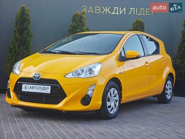 Желтый Тойота Aqua, объемом двигателя 1.5 л и пробегом 77 тыс. км за 10900 $, фото 1 на Automoto.ua