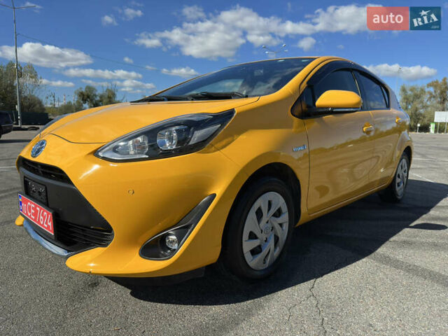 Желтый Тойота Aqua, объемом двигателя 1.5 л и пробегом 82 тыс. км за 13800 $, фото 1 на Automoto.ua