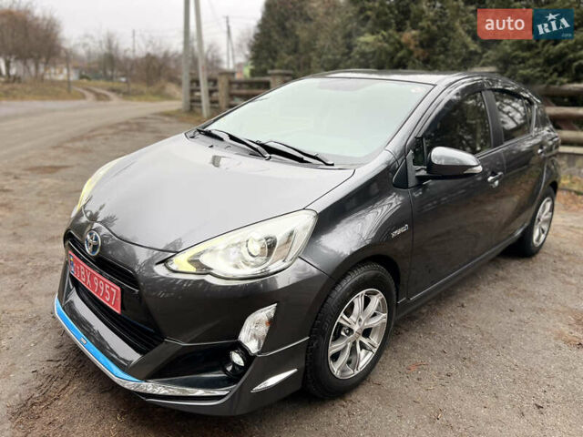 Серый Тойота Aqua, объемом двигателя 1.5 л и пробегом 61 тыс. км за 11400 $, фото 1 на Automoto.ua