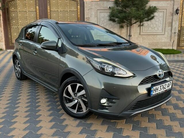 Сірий Тойота Aqua, об'ємом двигуна 1.5 л та пробігом 65 тис. км за 14600 $, фото 1 на Automoto.ua
