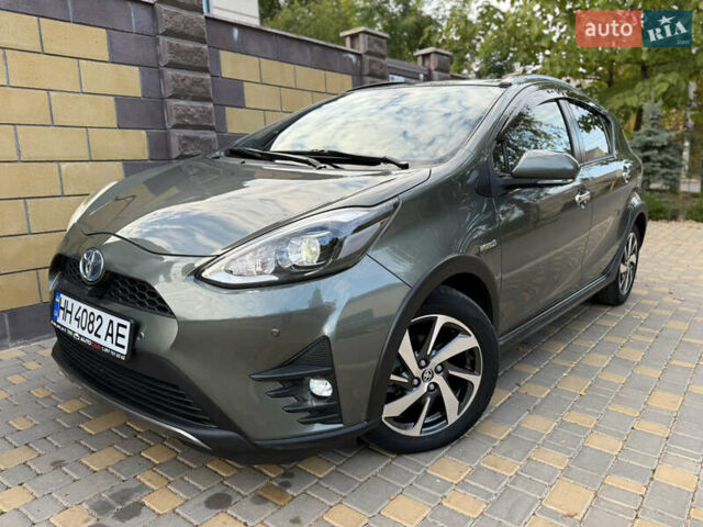 Серый Тойота Aqua, объемом двигателя 1.5 л и пробегом 57 тыс. км за 14900 $, фото 1 на Automoto.ua