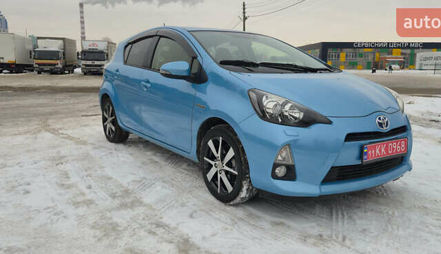 Синий Тойота Aqua, объемом двигателя 1.5 л и пробегом 57 тыс. км за 11700 $, фото 1 на Automoto.ua