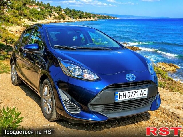 Синий Тойота Aqua, объемом двигателя 1.5 л и пробегом 95 тыс. км за 11100 $, фото 1 на Automoto.ua