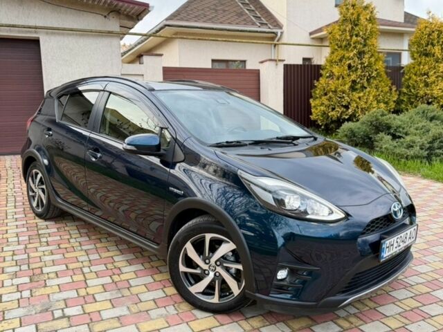 Синий Тойота Aqua, объемом двигателя 1.5 л и пробегом 66 тыс. км за 13100 $, фото 1 на Automoto.ua