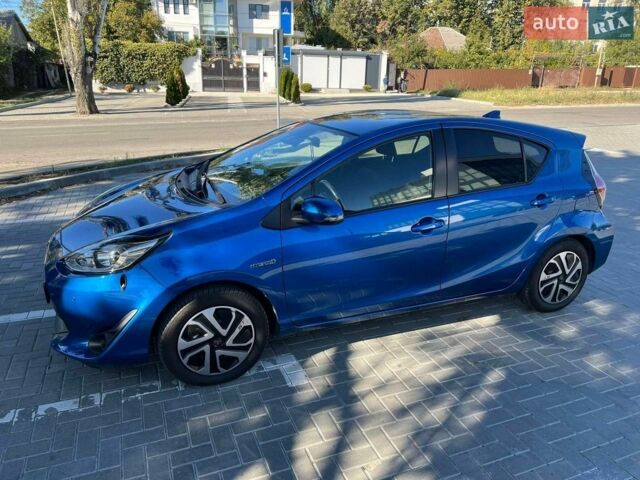 Синий Тойота Aqua, объемом двигателя 1.5 л и пробегом 128 тыс. км за 12000 $, фото 1 на Automoto.ua