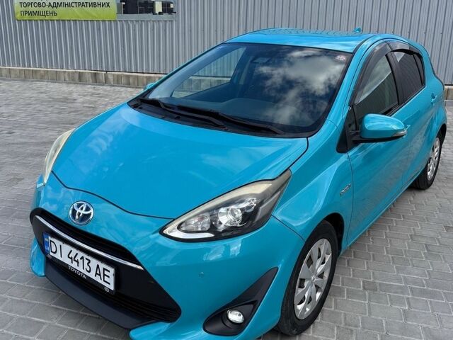 Синій Тойота Aqua, об'ємом двигуна 1.5 л та пробігом 104 тис. км за 13000 $, фото 1 на Automoto.ua