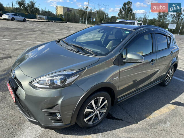 Зеленый Тойота Aqua, объемом двигателя 1.5 л и пробегом 93 тыс. км за 15500 $, фото 1 на Automoto.ua