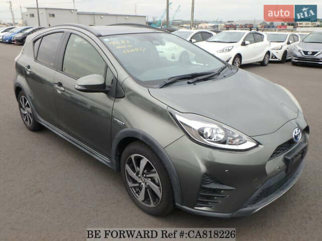 Зелений Тойота Aqua, об'ємом двигуна 1.5 л та пробігом 96 тис. км за 13500 $, фото 1 на Automoto.ua