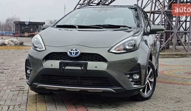 Зелений Тойота Aqua, об'ємом двигуна 1.5 л та пробігом 82 тис. км за 15900 $, фото 1 на Automoto.ua