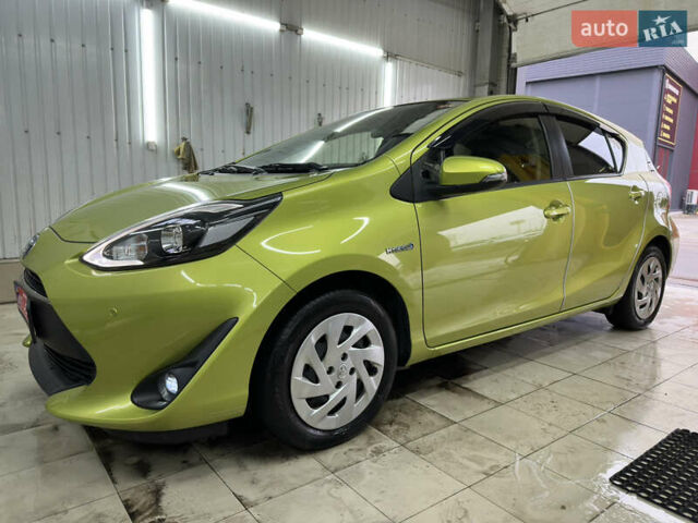 Зелений Тойота Aqua, об'ємом двигуна 1.5 л та пробігом 108 тис. км за 12900 $, фото 1 на Automoto.ua