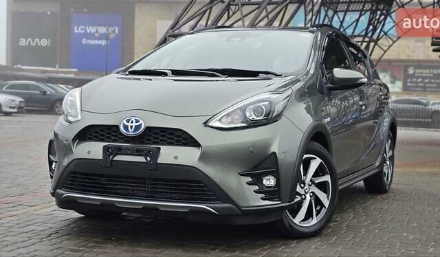 Зеленый Тойота Aqua, объемом двигателя 1.5 л и пробегом 86 тыс. км за 15500 $, фото 1 на Automoto.ua