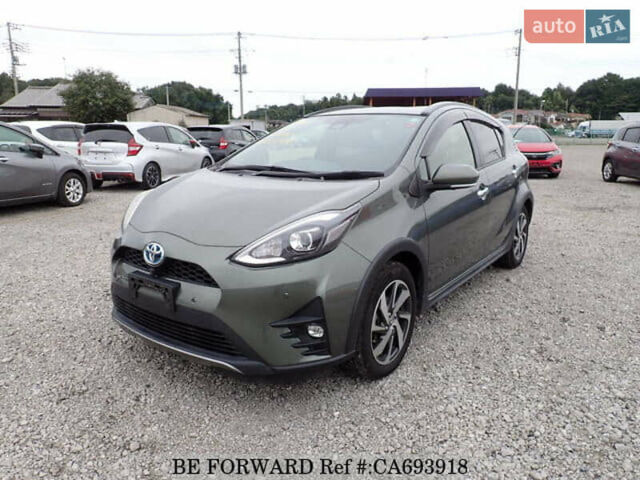 Зеленый Тойота Aqua, объемом двигателя 1.5 л и пробегом 58 тыс. км за 14600 $, фото 1 на Automoto.ua