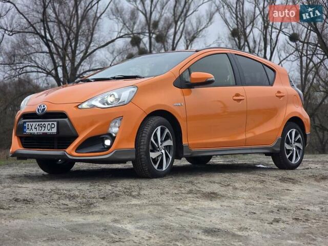 Оранжевый Тойота Aqua, объемом двигателя 1.5 л и пробегом 81 тыс. км за 11500 $, фото 1 на Automoto.ua