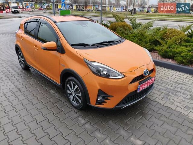 Оранжевый Тойота Aqua, объемом двигателя 1.5 л и пробегом 97 тыс. км за 13400 $, фото 1 на Automoto.ua
