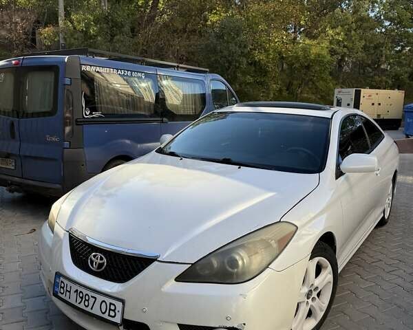 Белый Тойота Camry Solara, объемом двигателя 2.4 л и пробегом 100 тыс. км за 8500 $, фото 1 на Automoto.ua