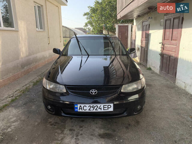 Черный Тойота Camry Solara, объемом двигателя 3 л и пробегом 200 тыс. км за 4500 $, фото 1 на Automoto.ua