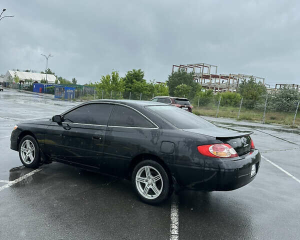 Черный Тойота Camry Solara, объемом двигателя 3 л и пробегом 200 тыс. км за 3999 $, фото 1 на Automoto.ua