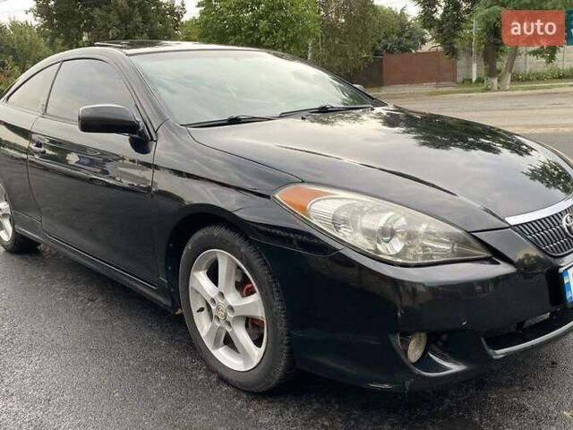 Черный Тойота Camry Solara, объемом двигателя 3.31 л и пробегом 250 тыс. км за 5200 $, фото 1 на Automoto.ua