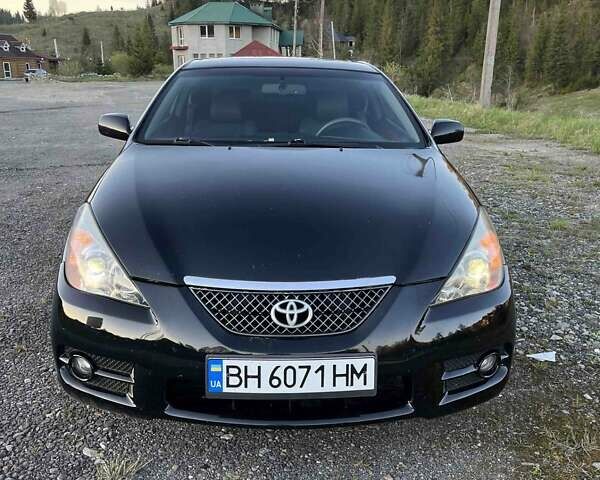 Черный Тойота Camry Solara, объемом двигателя 2.4 л и пробегом 200 тыс. км за 5600 $, фото 1 на Automoto.ua