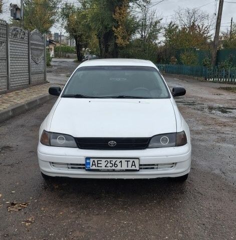 Белый Тойота Carina E, объемом двигателя 1.6 л и пробегом 390 тыс. км за 2300 $, фото 1 на Automoto.ua
