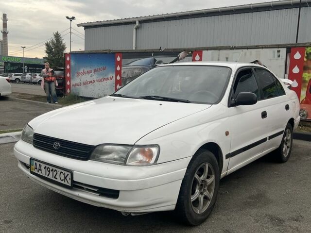 Белый Тойота Carina E, объемом двигателя 1.6 л и пробегом 228 тыс. км за 2100 $, фото 1 на Automoto.ua