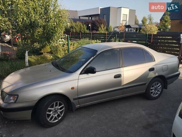 Коричневый Тойота Carina E, объемом двигателя 2 л и пробегом 607 тыс. км за 2500 $, фото 1 на Automoto.ua