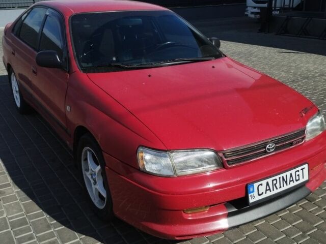Красный Тойота Carina E, объемом двигателя 2 л и пробегом 400 тыс. км за 3500 $, фото 1 на Automoto.ua