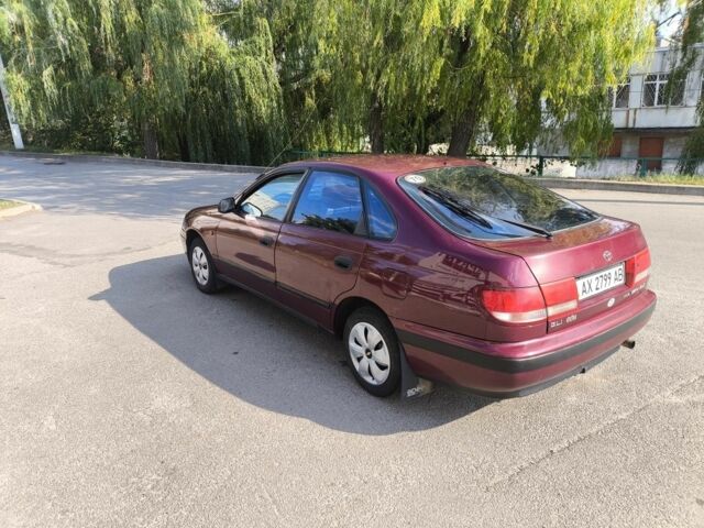 Красный Тойота Carina E, объемом двигателя 1.6 л и пробегом 340 тыс. км за 2299 $, фото 1 на Automoto.ua