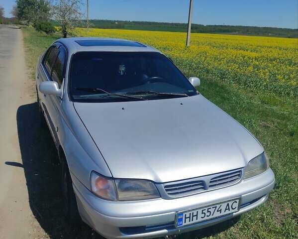 Серый Тойота Carina E, объемом двигателя 1.97 л и пробегом 530 тыс. км за 3000 $, фото 1 на Automoto.ua