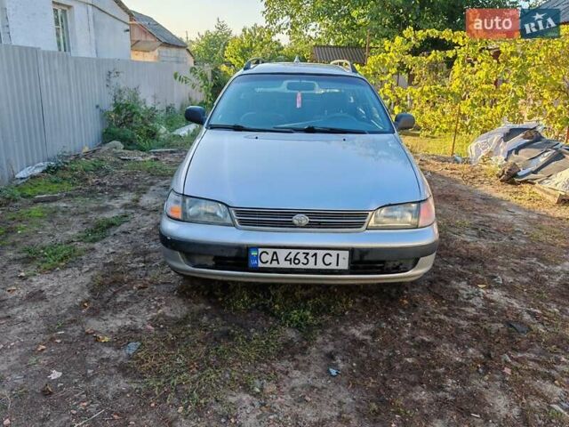 Сірий Тойота Carina E, об'ємом двигуна 1.8 л та пробігом 256 тис. км за 2850 $, фото 1 на Automoto.ua