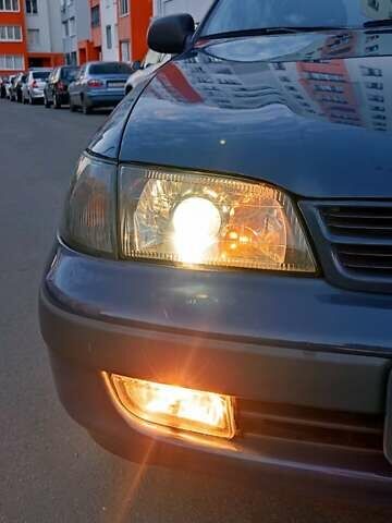 Синій Тойота Carina E, об'ємом двигуна 2 л та пробігом 397 тис. км за 4750 $, фото 1 на Automoto.ua