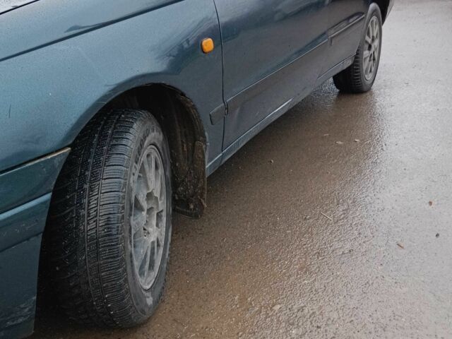 Синий Тойота Carina E, объемом двигателя 1.6 л и пробегом 425 тыс. км за 1700 $, фото 1 на Automoto.ua