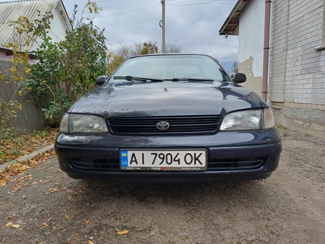 Синий Тойота Carina E, объемом двигателя 1.8 л и пробегом 280 тыс. км за 2250 $, фото 1 на Automoto.ua