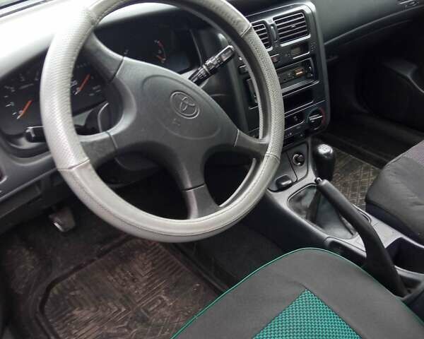 Синий Тойота Carina E, объемом двигателя 2 л и пробегом 460 тыс. км за 1000 $, фото 1 на Automoto.ua