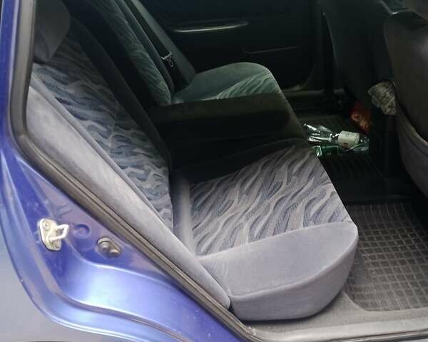 Синий Тойота Carina E, объемом двигателя 1.8 л и пробегом 425 тыс. км за 3200 $, фото 1 на Automoto.ua