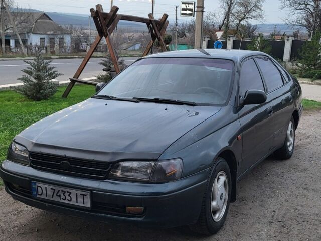 Синій Тойота Carina E, об'ємом двигуна 1.8 л та пробігом 290 тис. км за 1650 $, фото 1 на Automoto.ua