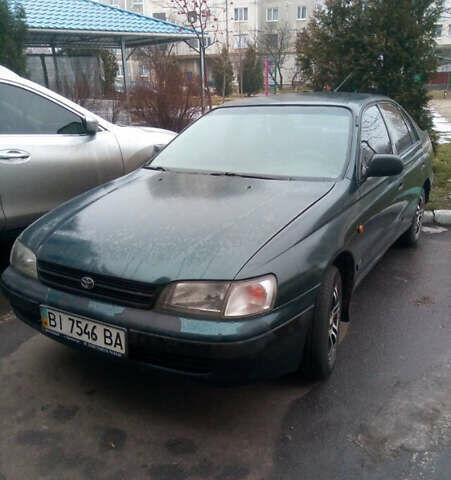 Зеленый Тойота Carina E, объемом двигателя 1.6 л и пробегом 180 тыс. км за 2099 $, фото 1 на Automoto.ua