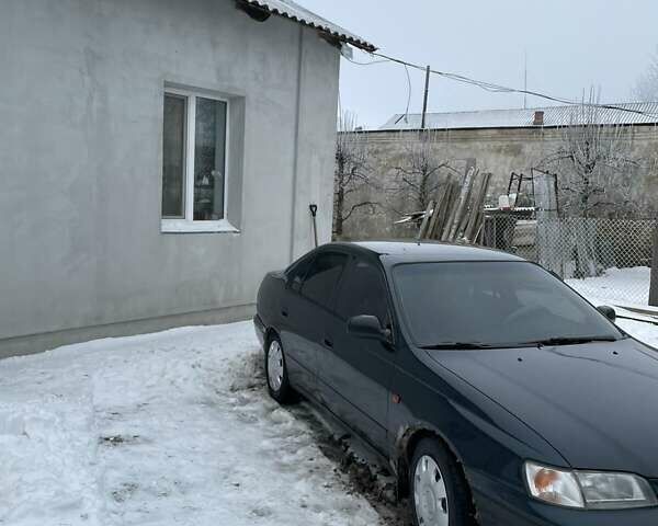 Зеленый Тойота Carina E, объемом двигателя 1.6 л и пробегом 444 тыс. км за 3600 $, фото 1 на Automoto.ua