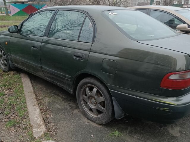 Зеленый Тойота Carina E, объемом двигателя 1.6 л и пробегом 360 тыс. км за 1400 $, фото 1 на Automoto.ua