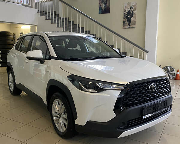 Белый Тойота Corolla Cross, объемом двигателя 2 л и пробегом 1 тыс. км за 28499 $, фото 1 на Automoto.ua