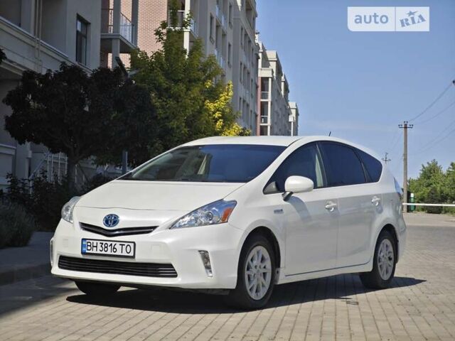 Білий Тойота Prius v, об'ємом двигуна 1.8 л та пробігом 73 тис. км за 14900 $, фото 1 на Automoto.ua