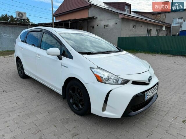 Білий Тойота Prius v, об'ємом двигуна 1.8 л та пробігом 313 тис. км за 12800 $, фото 1 на Automoto.ua